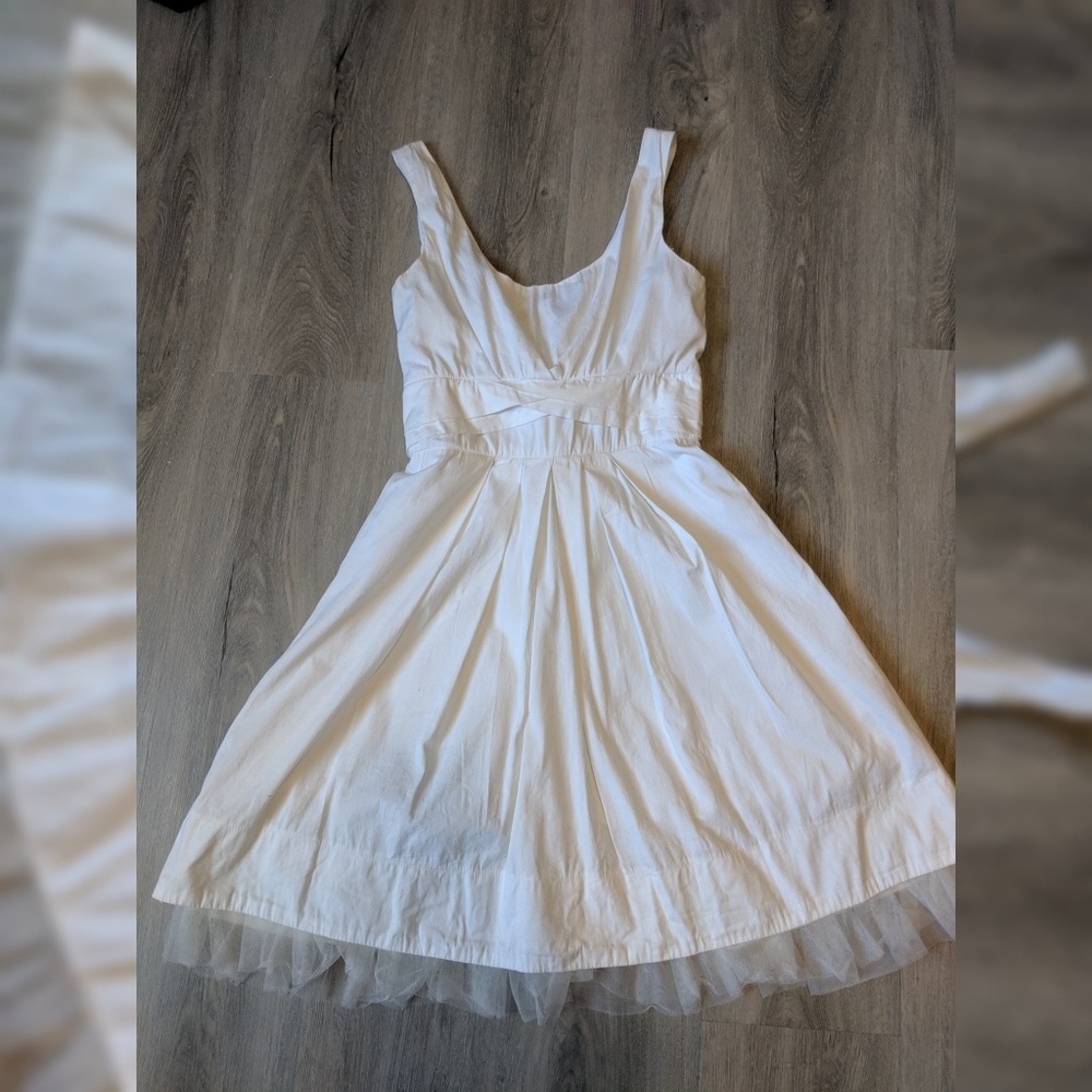 White sun dress with Tulle Accent.